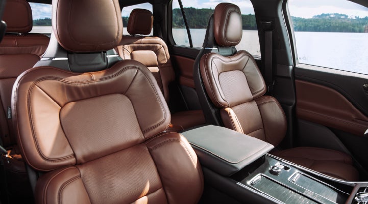 The front row's Perfect Position Seats in a 2024 Lincoln Aviator® Reserve model with Ebony Roast interior | Randy Marion Lincoln in Statesville NC