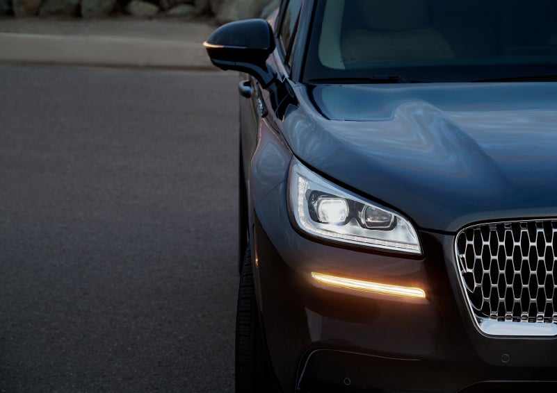 The turn signal on the front fascia is a bold sunset orange stroke of brilliance against a Flight Blue exterior | Randy Marion Lincoln in Statesville NC