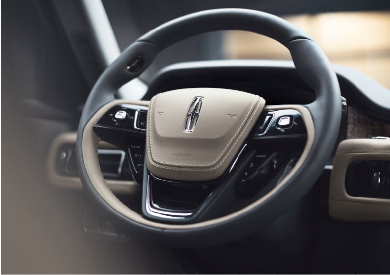 The intuitively placed controls of the steering wheel on a 2023 Lincoln Aviator® SUV | Randy Marion Lincoln in Statesville NC