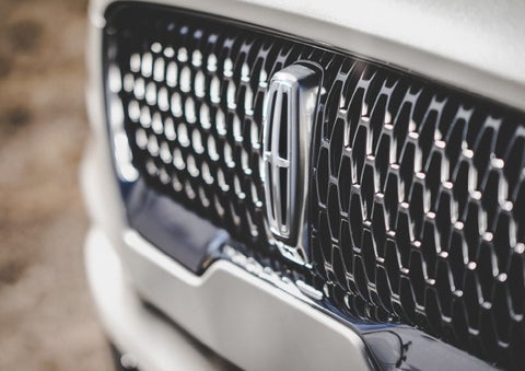 The grille of the 2024 Lincoln Aviator® Reserve model with an eye-catching repeated field of Lincoln Star logo shapes | Randy Marion Lincoln in Statesville NC