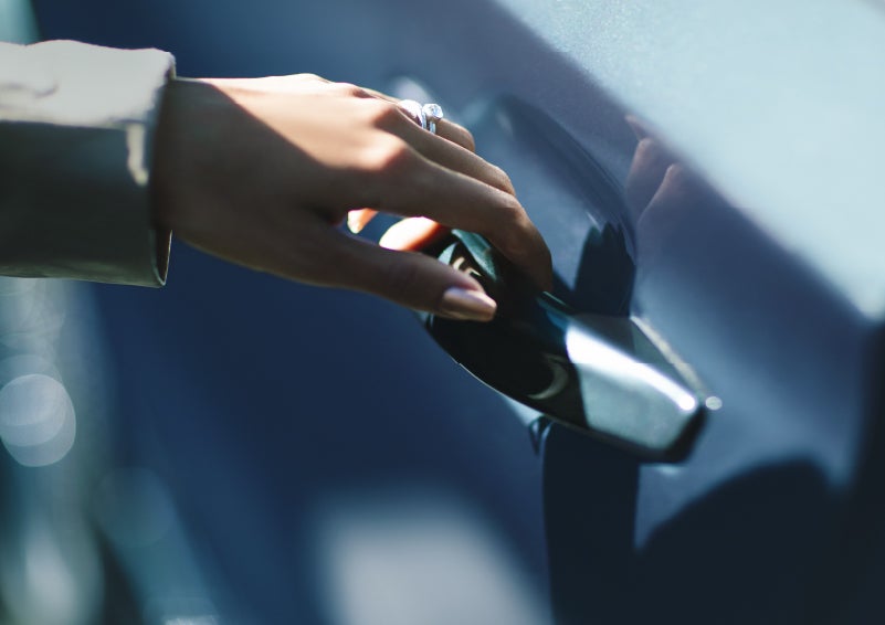 A hand gracefully grips the Light Touch Handle of a 2024 Lincoln Aviator® SUV to demonstrate its ease of use | Randy Marion Lincoln in Statesville NC