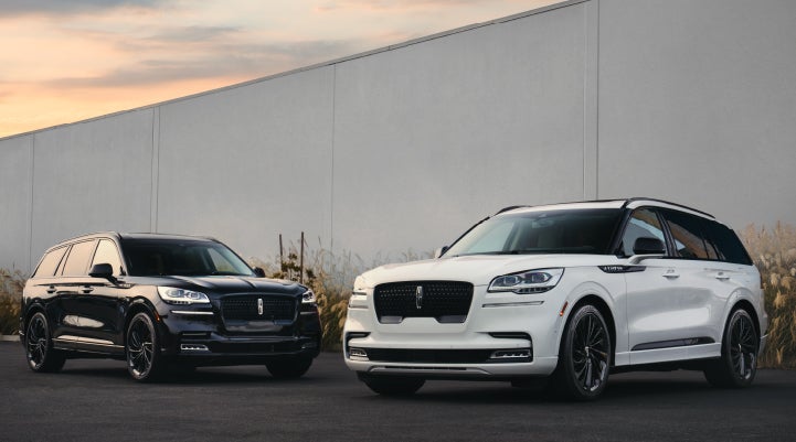Two Lincoln Aviator® SUVs are shown with the available Jet Appearance Package | Randy Marion Lincoln in Statesville NC