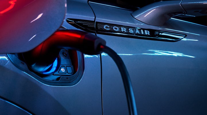 A charger plugged into the charging port of a 2024 Lincoln Corsair® Plug-in Hybrid model. | Randy Marion Lincoln in Statesville NC