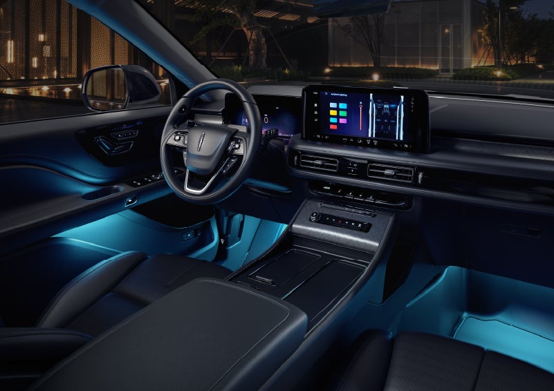 Deep blue ambient lighting glows from various places within a 2026 Lincoln Aviator® SUV. | Randy Marion Lincoln in Statesville NC