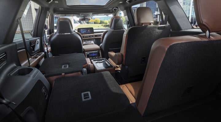 One side of the PowerFold® third-row seat and a second-row seat are folded forward in the 2026 Lincoln Aviator® SUV. | Randy Marion Lincoln in Statesville NC