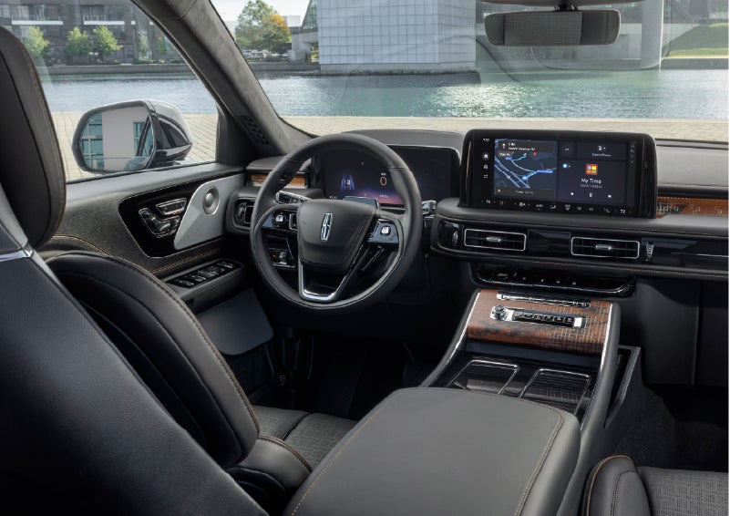 The interior of the 2026 Lincoln Aviator® SUV is shown parked with a view of a harbor through the windshield. | Randy Marion Lincoln in Statesville NC
