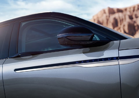 Blue lettering on the side of the vehicle that reads Nautilus indicates the available Hybrid Powertrain. | Randy Marion Lincoln in Statesville NC